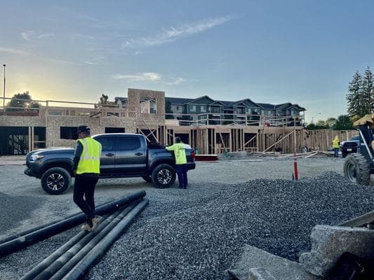 SNV team walking an active construction site