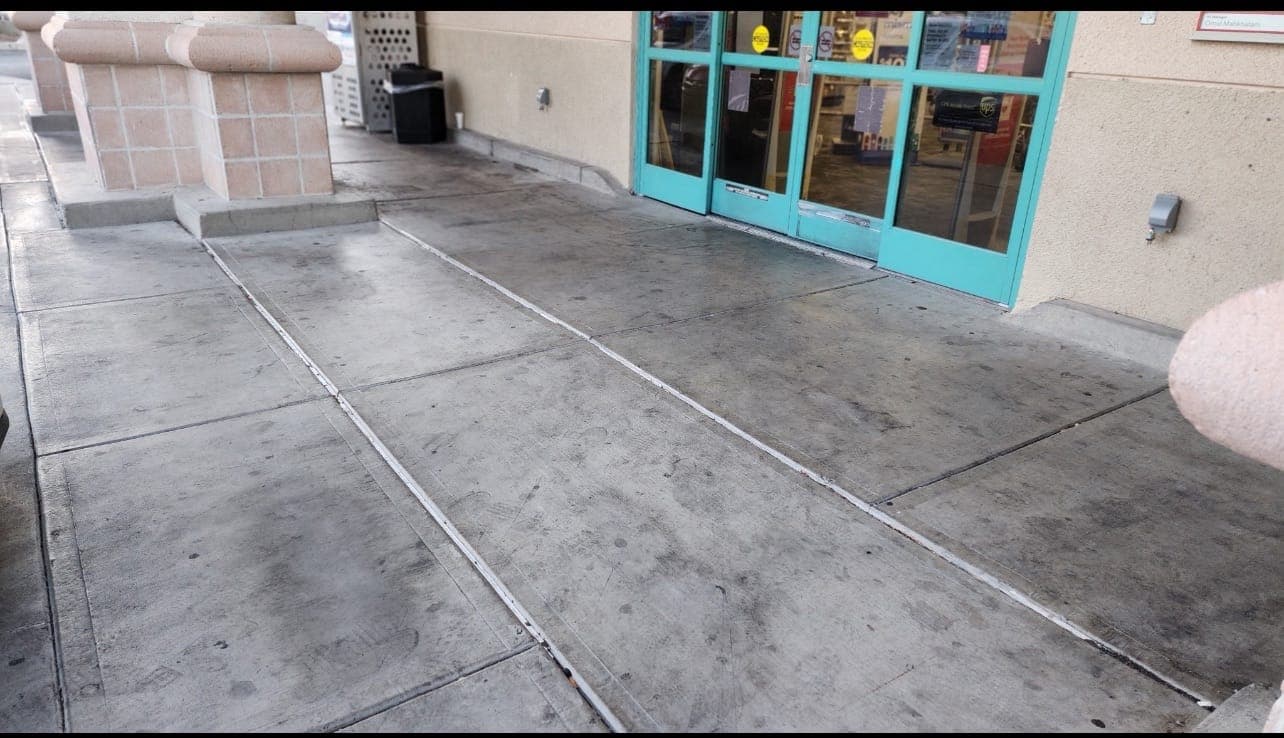 Entry walkway — pressure washed before repaint — North Las Vegas, NV 89032